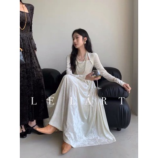 Váy lf trắng nhung cổ vuông tay dài dáng a xoè dài
