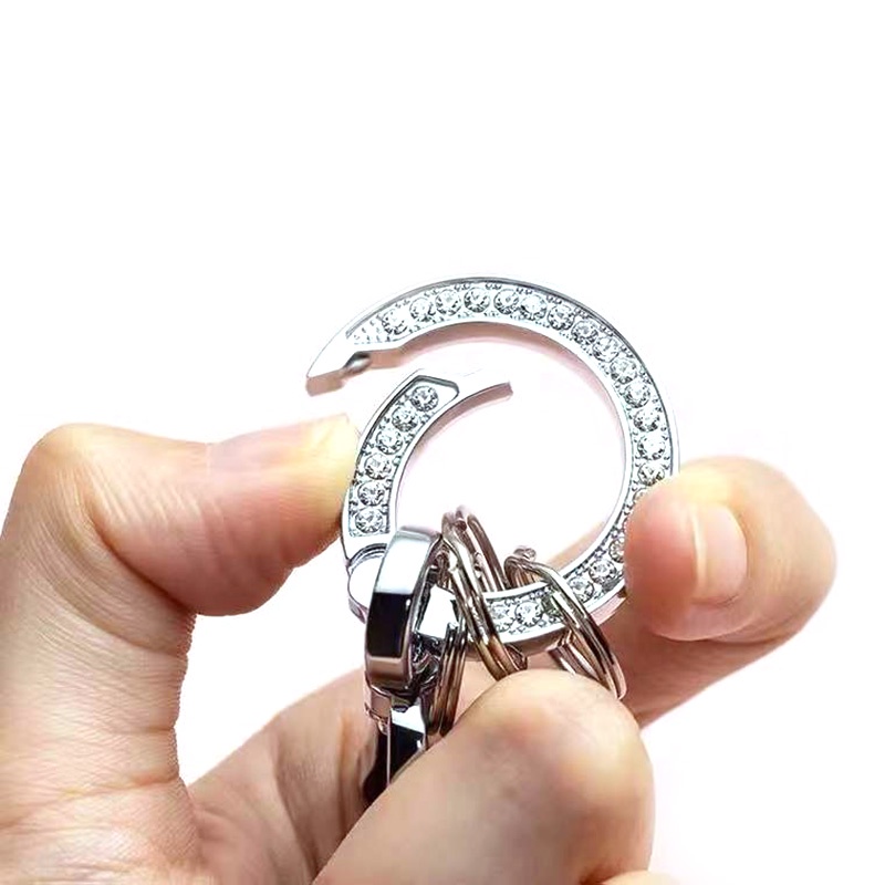 Móc Khóa Xe Hơi Dạng Lò Xo Đính Đá Xoay 360 Độ Bằng Kim Loại Chất Lượng Cao