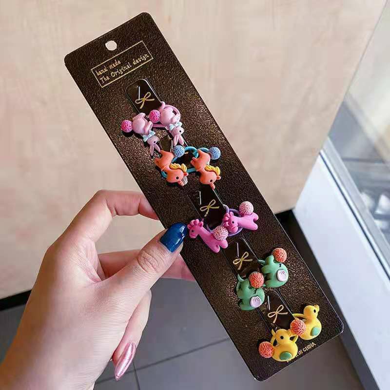 Chun buộc tóc nhiều hình đáng yêu cho bé