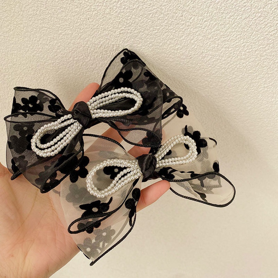 Kẹp Tóc Hình Nơ Đính Ngọc Trai Dễ Thương Cho Nữ