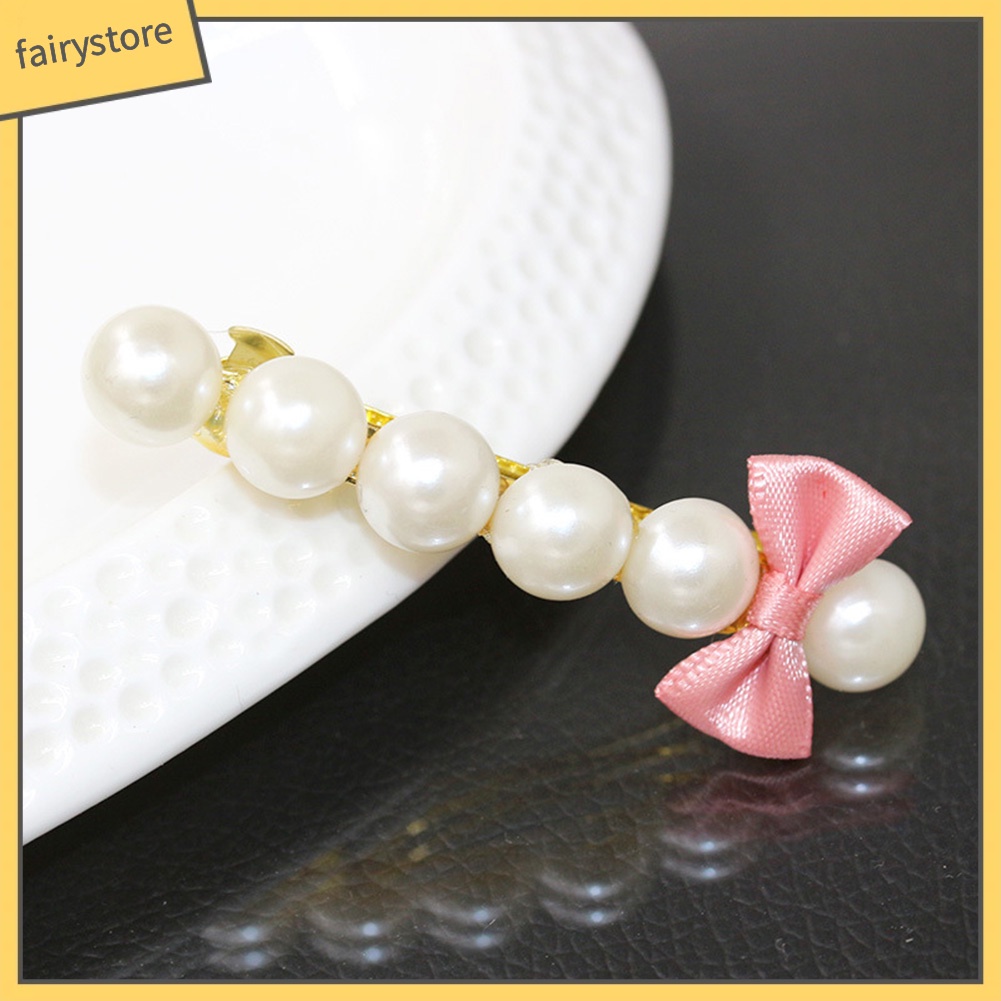 Kẹp tóc hình nơ đính ngọc trai thời trang