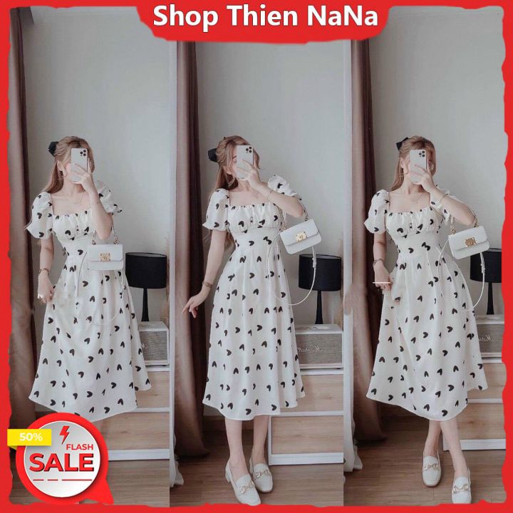Đầm Nhún Ngực Tay Bồng Dáng Xòe Họa Tiết Tim Đen Kết Nơ Đen Sau Lưng Dễ Thương