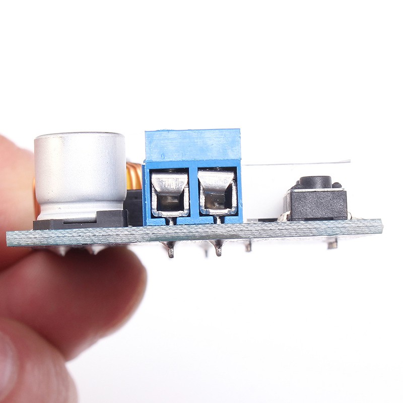 Mô Đun Hạ Áp DC-DC 5-36V Sang 1.2V-32V 5A 75W Có Vôn Kế