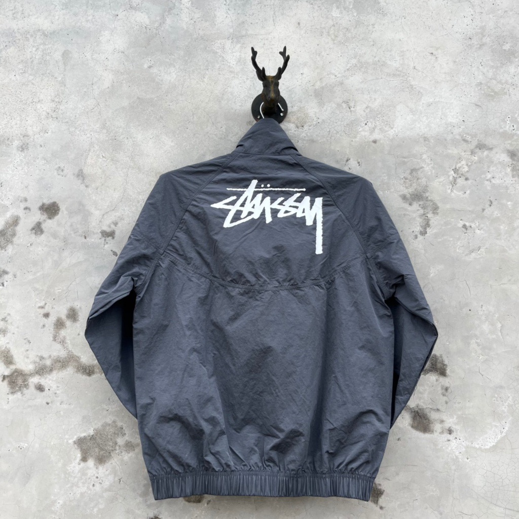 Áo Khoác Gió Nike x Stussy Swoosh Tay Dài Phối Khóa Kéo Màu Đen Phong Cách Retro Cho Nam