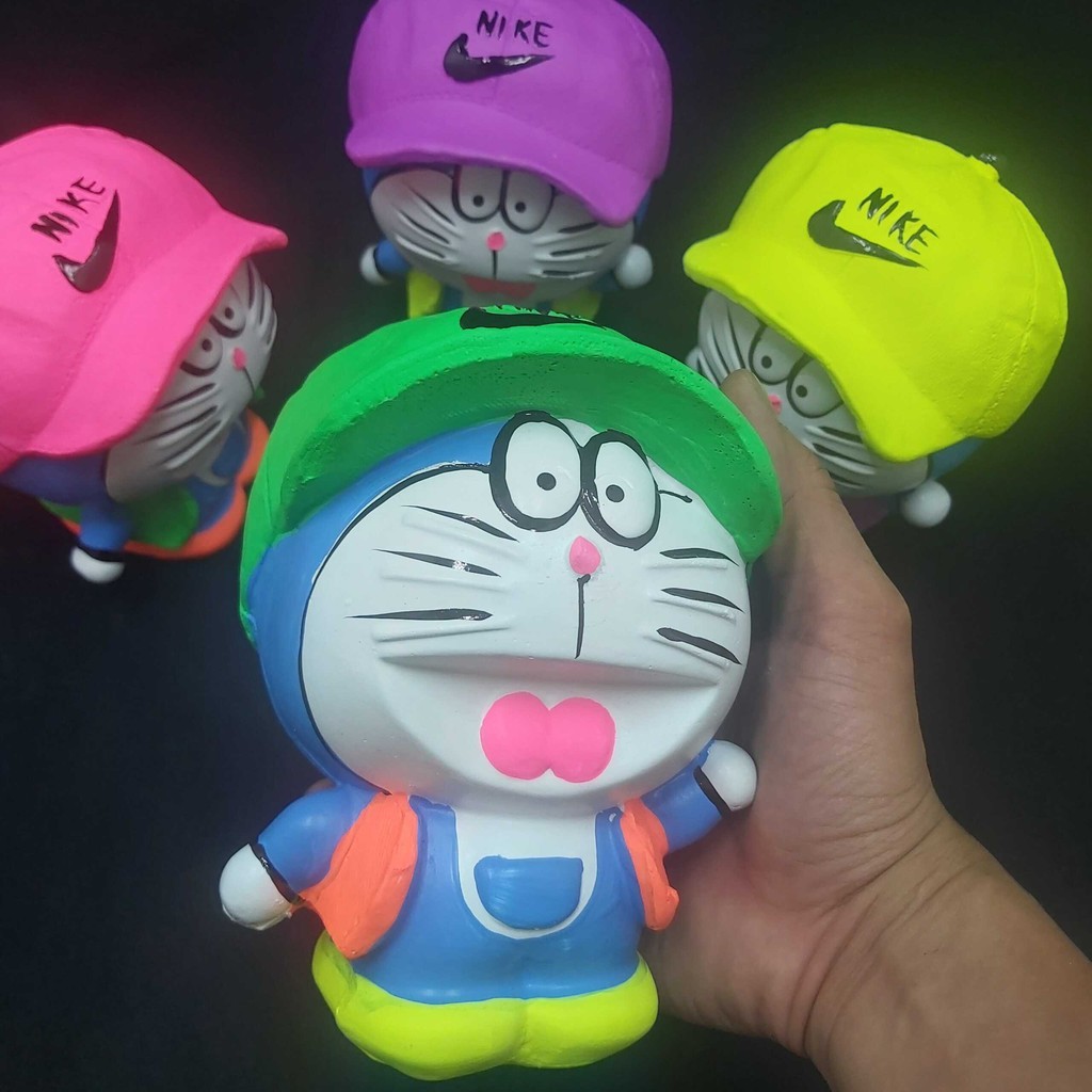 Ống Heo Tiết Kiệm Tiền Nhỏ mẫu DORAEMON Đội Nón cực HOT – Heo đất làm quà tặng sinh nhật được trẻ em yêu thích