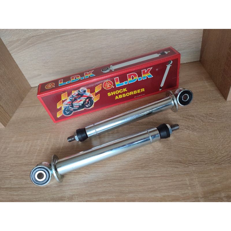 Ty phuộc sau xe wave Dream future sirius taurus jupiter nouvo air blade vision