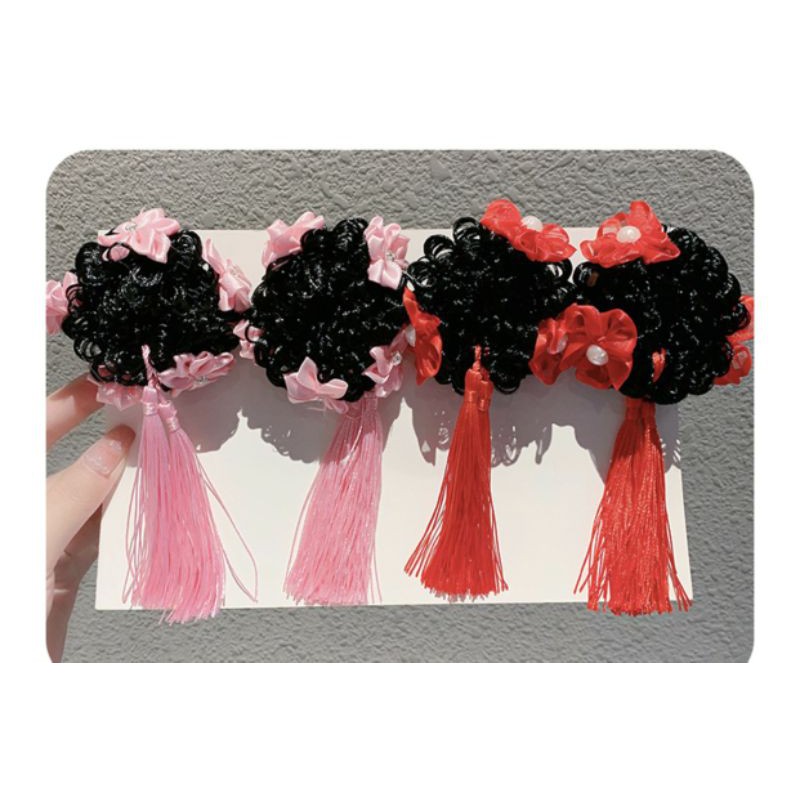 Tóc búi tuarua cho bé