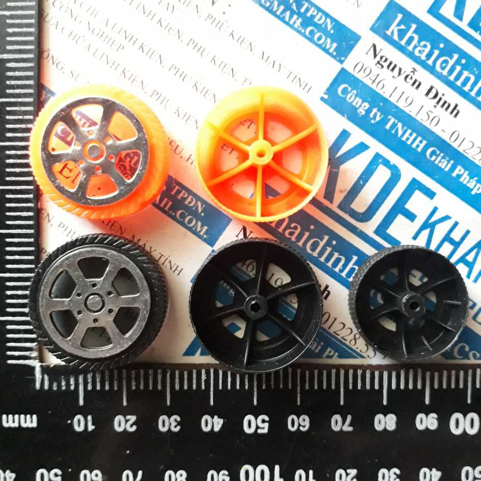 [Mã ELFLASH3 hoàn 10K xu đơn 20K] bánh xe nhựa, không lốp 30mm trục 2mm, màu cam/đen (gói 5 cái) kde2935