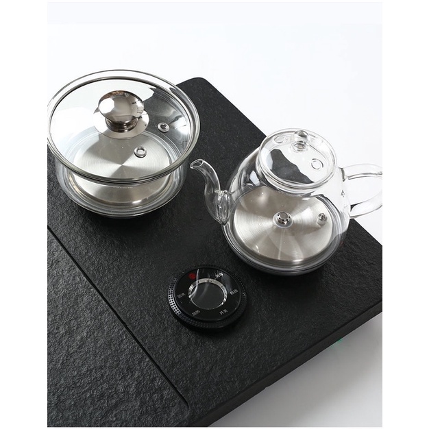 Khay trà điện đá đen nguyên khối tự động