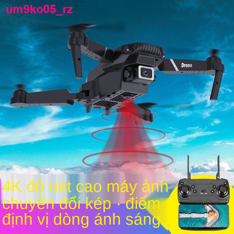 đồ sơ sinhGấp máy bay điều khiển từ xa độ cao cố định 4k UAV HD chuyên nghiệp chụp ảnh trên không quadcopter đồ chơi