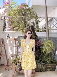 Váy hoa cúc cổ vuông nơ bèo