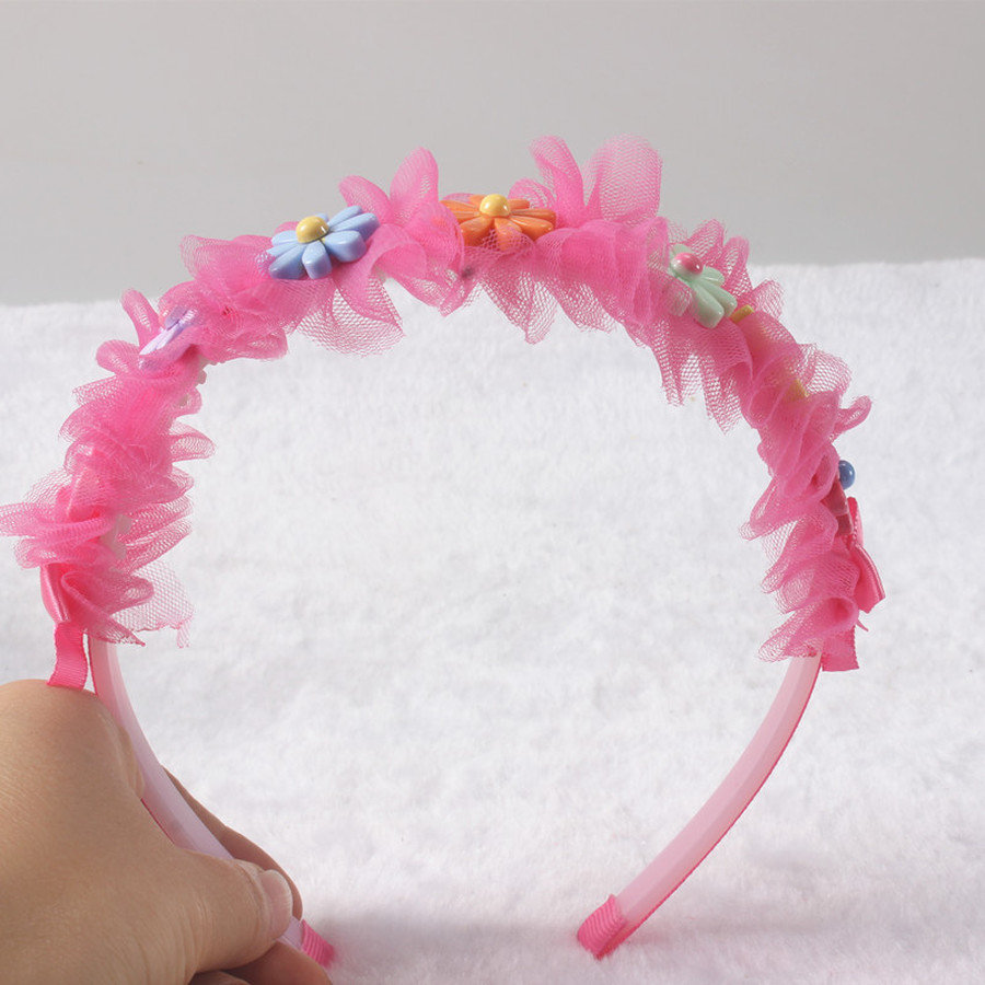 Cài tóc đính hoa xinh xắn cho bé gái