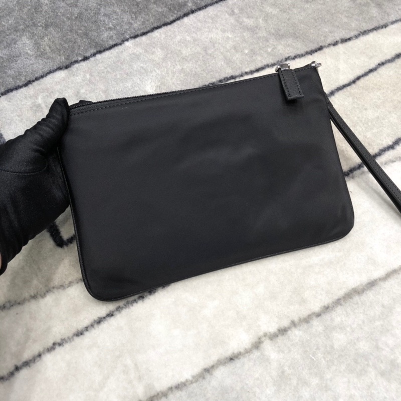 Clutch cầm tay cho nam thương hiệu thời trang cao cấp Prada chất liệu vải chống nước