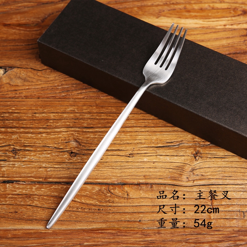Western steak cutlery and Western style Portuguese silver knife and fork.