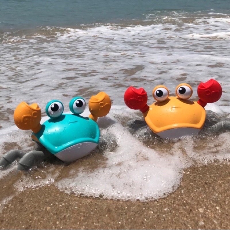 Đồ chơi cho bé Cua chạy pin dắt đi chơi có nhạc và có đèn led