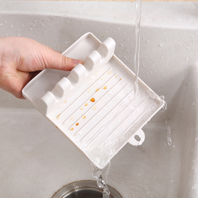 Anti-drip plastic spoon and chopsticks holder convenient for the kitchen