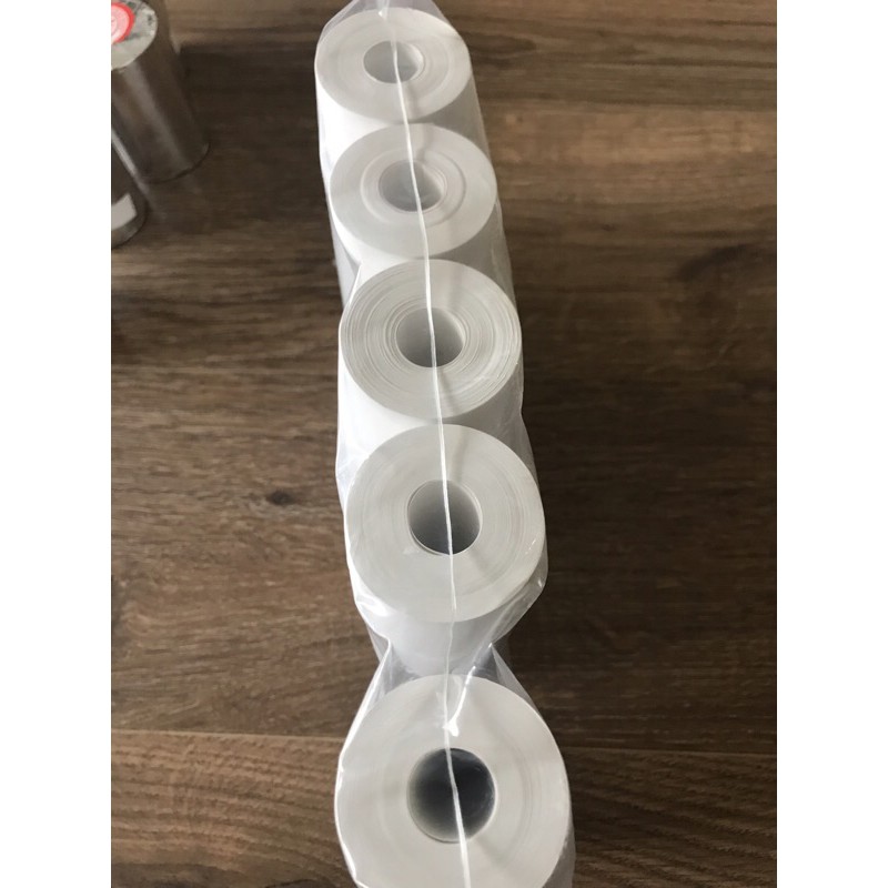 Giấy in nhiệt/ Giấy in hoá đơn Arika in bill k57 /k58 mm bọc bạc mưc đen