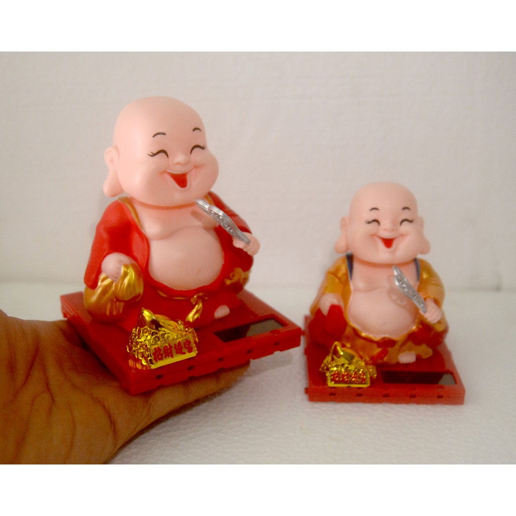 Tượng Di Lặc vẫy quạt-Thần tài thỏi vàng-Con lân gật đầu năng lượng mặt trời