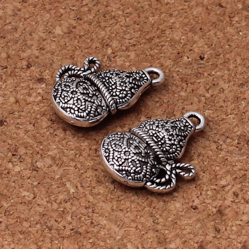 1 charm hạt xỏ hoa văn bạc tây tạng nguyên liệu làm trâm làm trang sức cổ trang