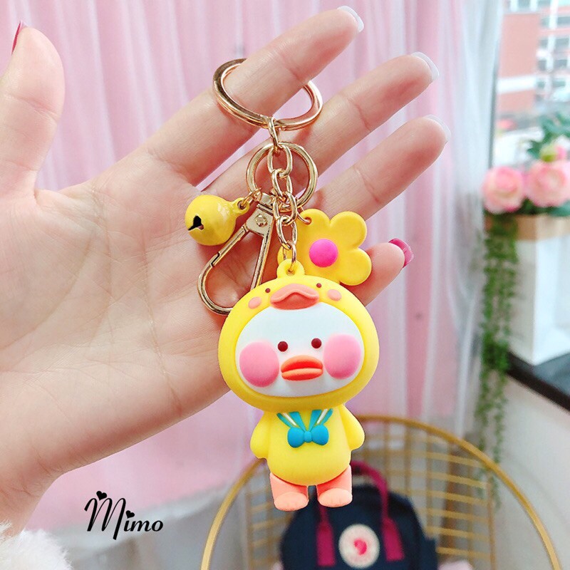 [HÀNG MỚI] Móc khóa vịt môi tều kèm bông hoa và quả chuông kiểu dáng  cute đáng yêu 4 màu xinh xắn độc đáo