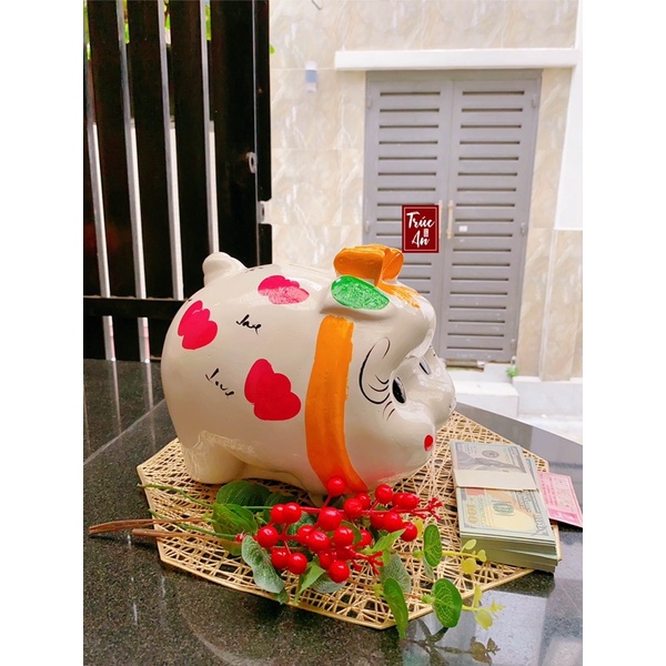 [CHỈ GIAO HCM] (26x23x23cm) Heo đất thạch cao mẫu Nơ Dây, size lớn, nước sơn bóng mịn. Hàng có sẵn