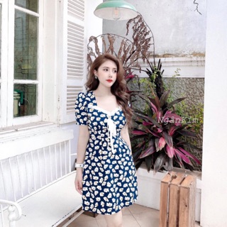 Váy hoa cúc cổ vuông nơ trước