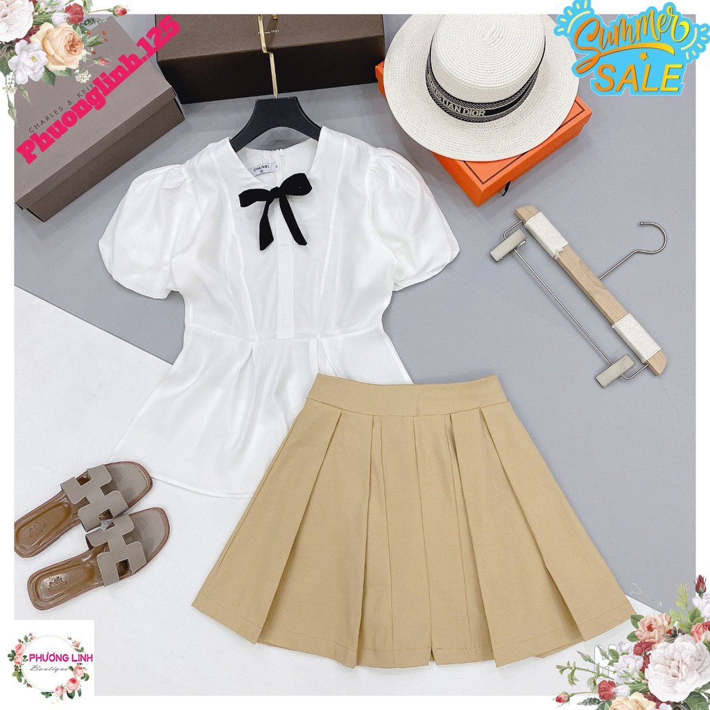 ÁO SƠ MI PEPLUM ĐÍNH NƠ ĐEN TAY BỒNG