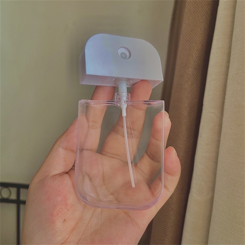 Bình xịt nước hoa mini trong suốt có móc khóa dung tích 50ml nhỏ gọn
