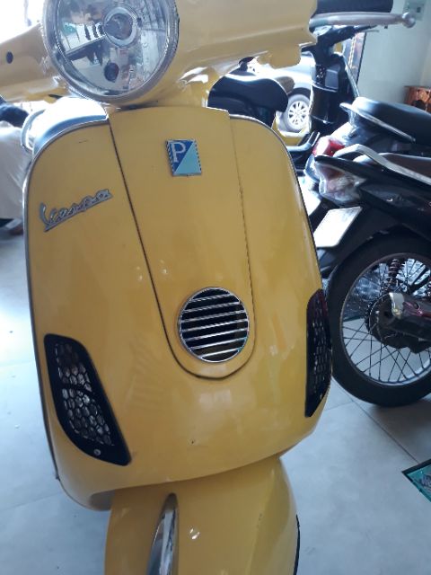 Ốp xi nhan Vespa lx125, lx150 3vie