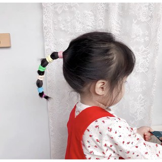 dây buộc tóc sắc màu túi zip hoa cúc cho bé