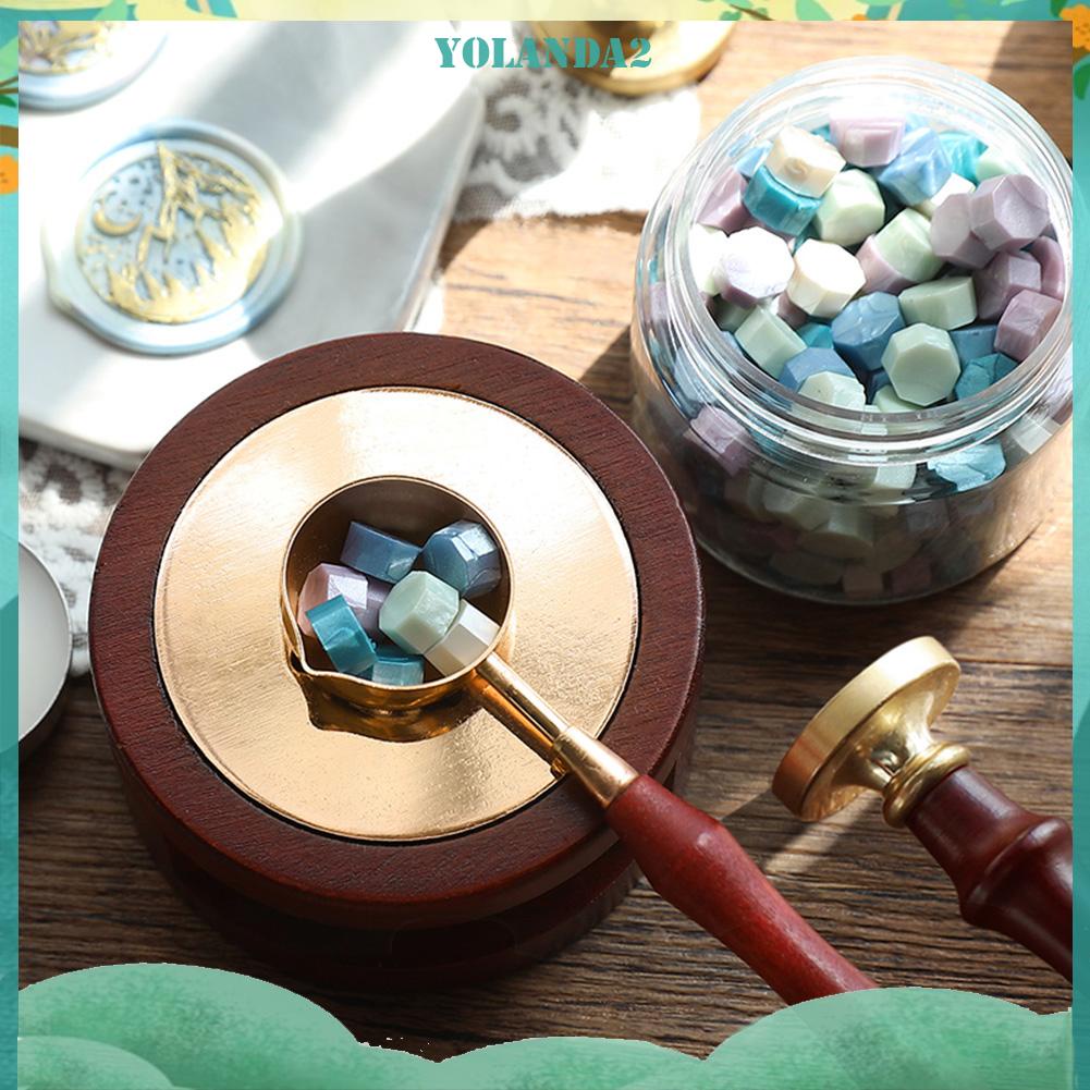 Muỗng nấu chảy sáp cán gỗ tiện dụng