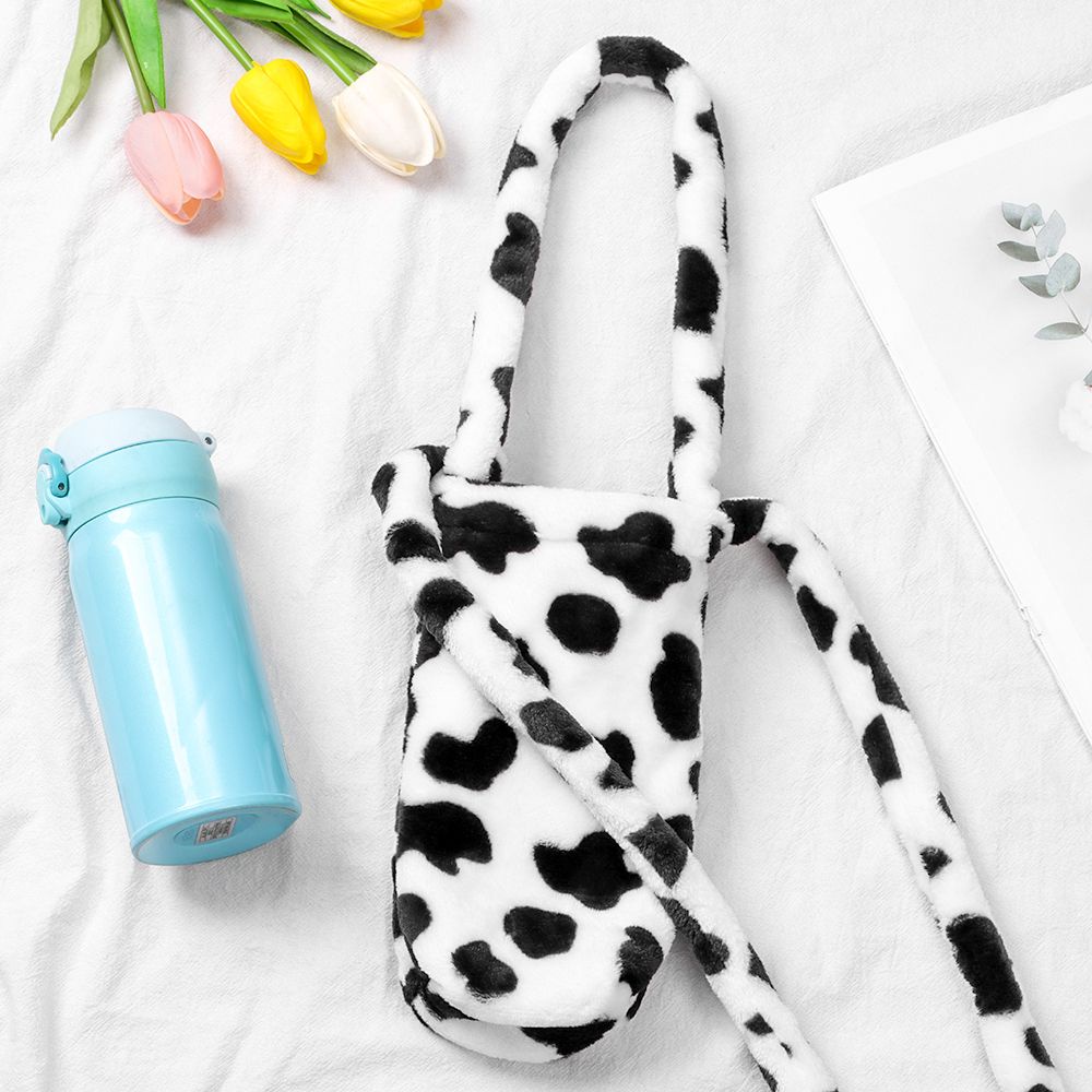 Quai đựng ly nước bằng vải lông có dây đeo họa tiết bò sữa dễ thương cho học sinh sinh viên