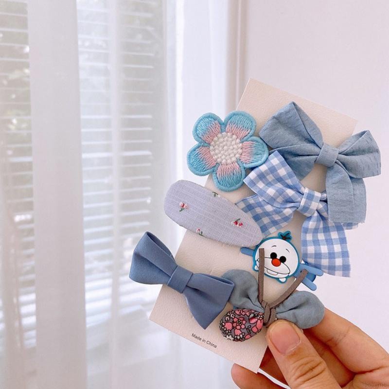 Kẹp tóc hình nơ màu kẹo ngọt ngào đáng yêu cho bé