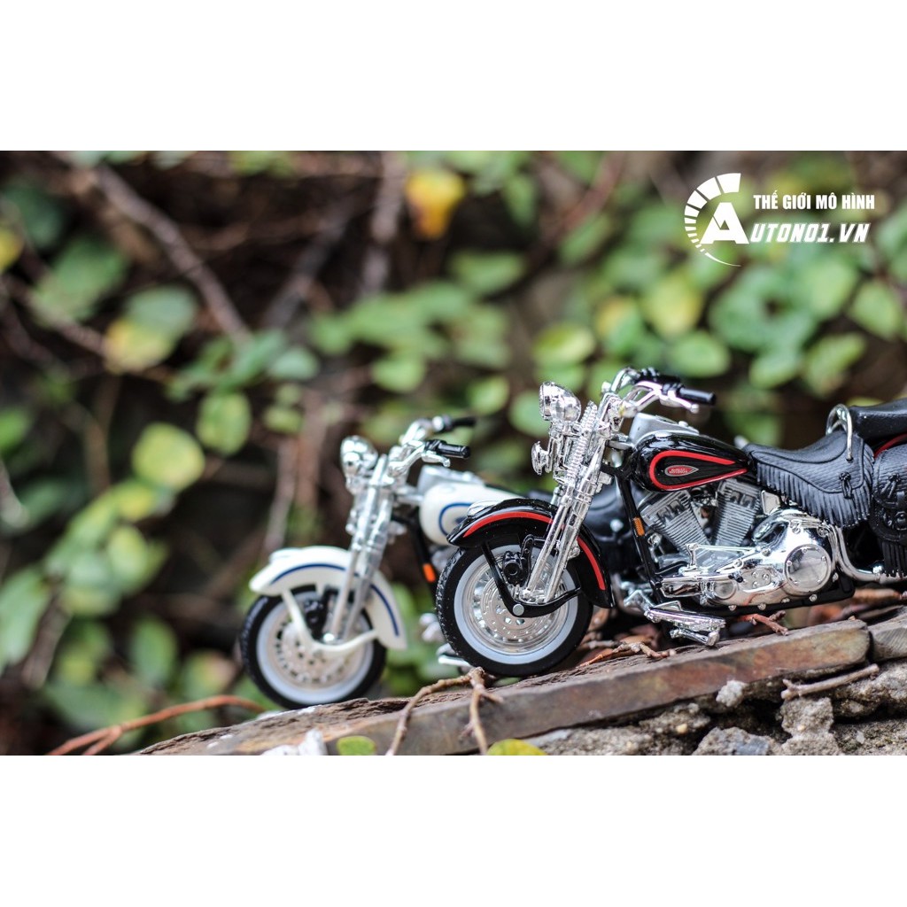 MÔ HÌNH HARLEY DAVIDSON 1998 FLSTS HERITAGE SPRINGER 1:18 MAISTO 3614