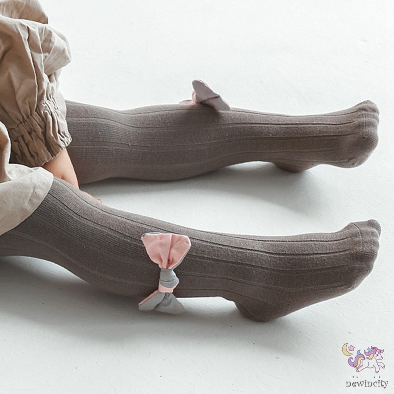 Quần legging phối nơ phong cách thời trang tinh tế cho bé gái