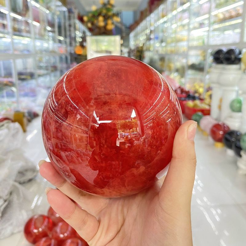 Quả Bi cầu phong thủy đá núi lửa ĐỎ từ 8cm đến 15cm tặng đế gỗ