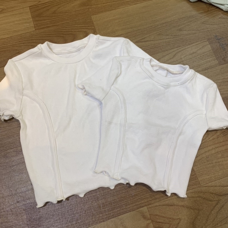 Áo cotton bé gái cổ tròn tay ngắn túi ngực, vạt tôm nhẹ, hàng dư lỗi