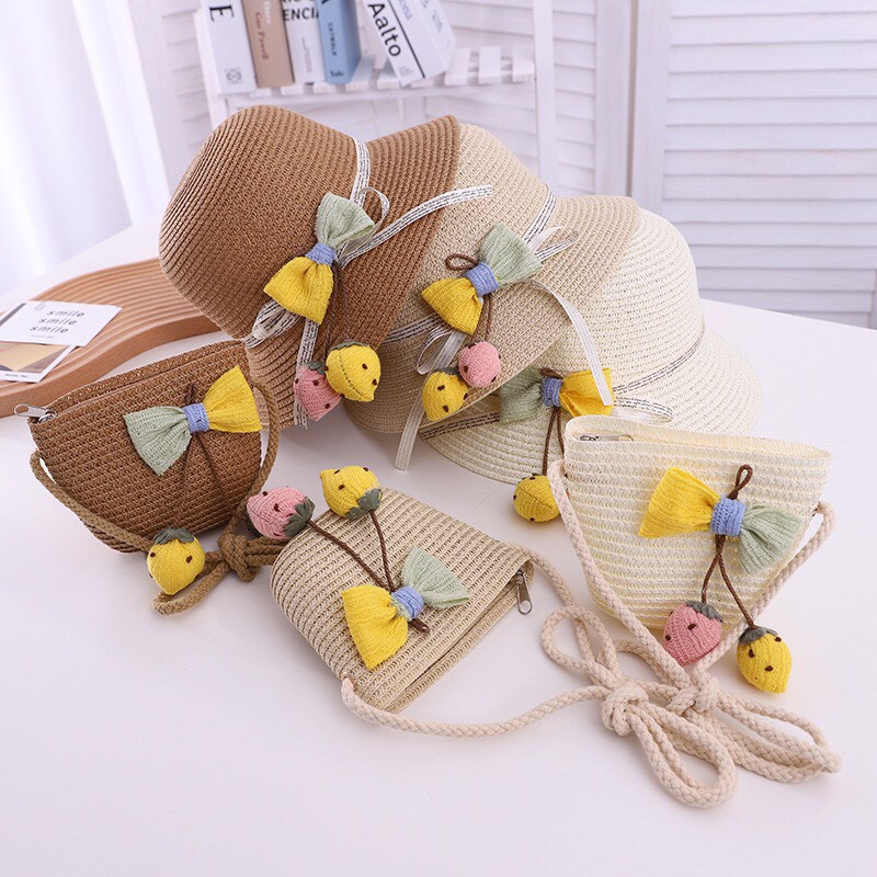 Set mũ cói kèm túi rộng vành chống nắng nơ vàng siêu xinh co bé(2-5tuổi)