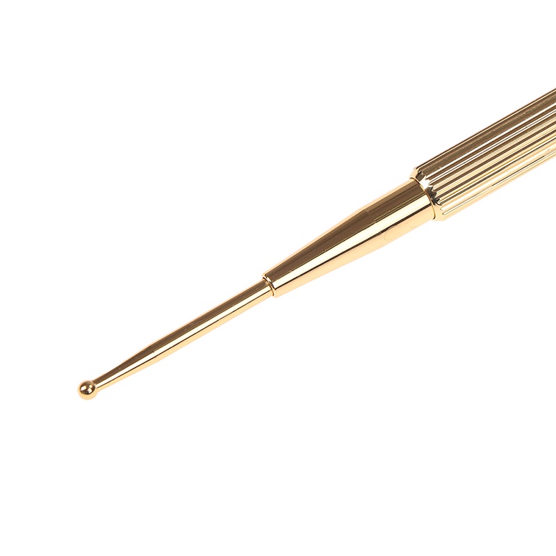 1 Dụng Cụ Mát Xa Tai Bằng Đồng