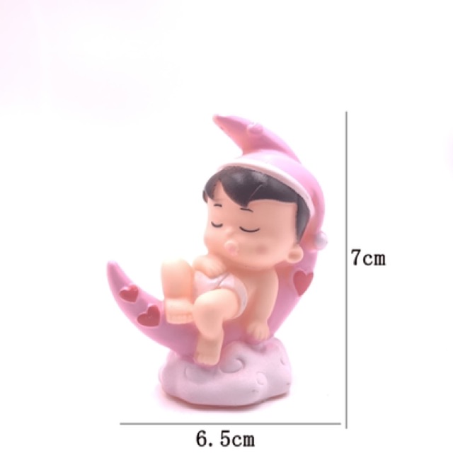 Em bé nằm trên trăng (nhựa) trang trí bánh kem