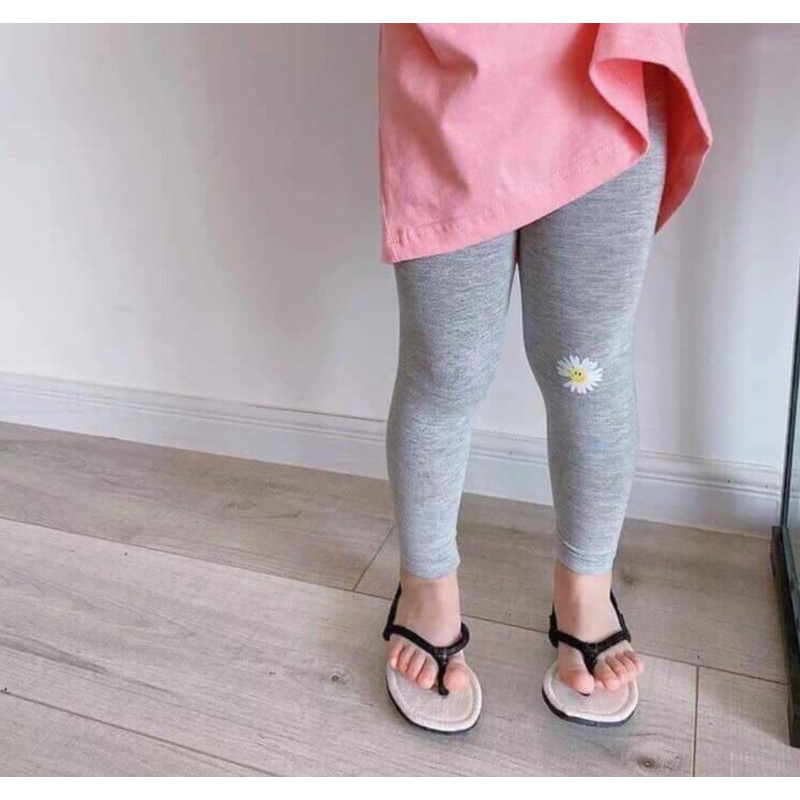 Quần legging hoa cúc bé gái