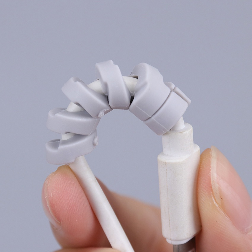 1 Dụng Cụ Quấn Bảo Vệ Dây Cáp Sạc / Tai Nghe Điện Thoại Bằng Silicon Tiện Dụng