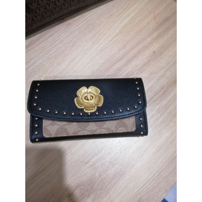 Ví coach da thật chị Quỳnh