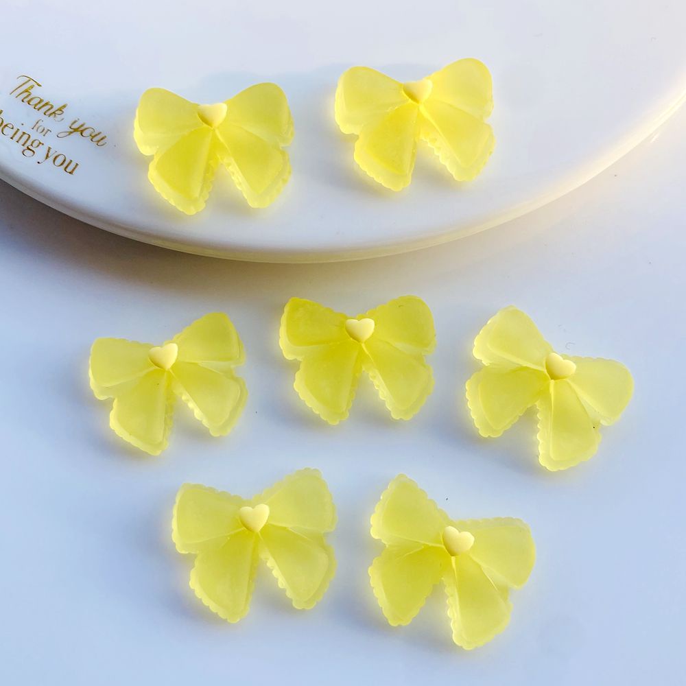 Set 10 Dây Cột Tóc Đính Nơ Nhựa Xinh Xắn