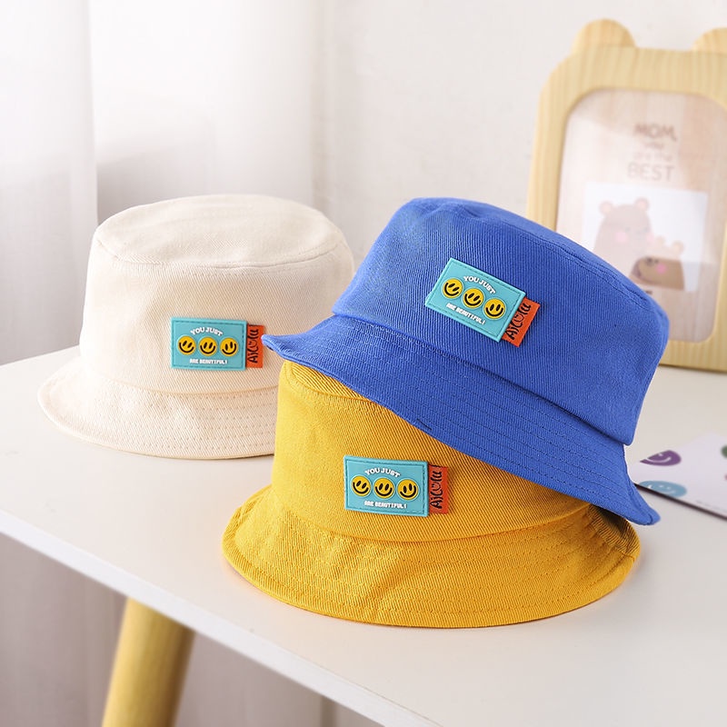 Mũ bucket da họa tiết mặt cười dễ thương cho bé