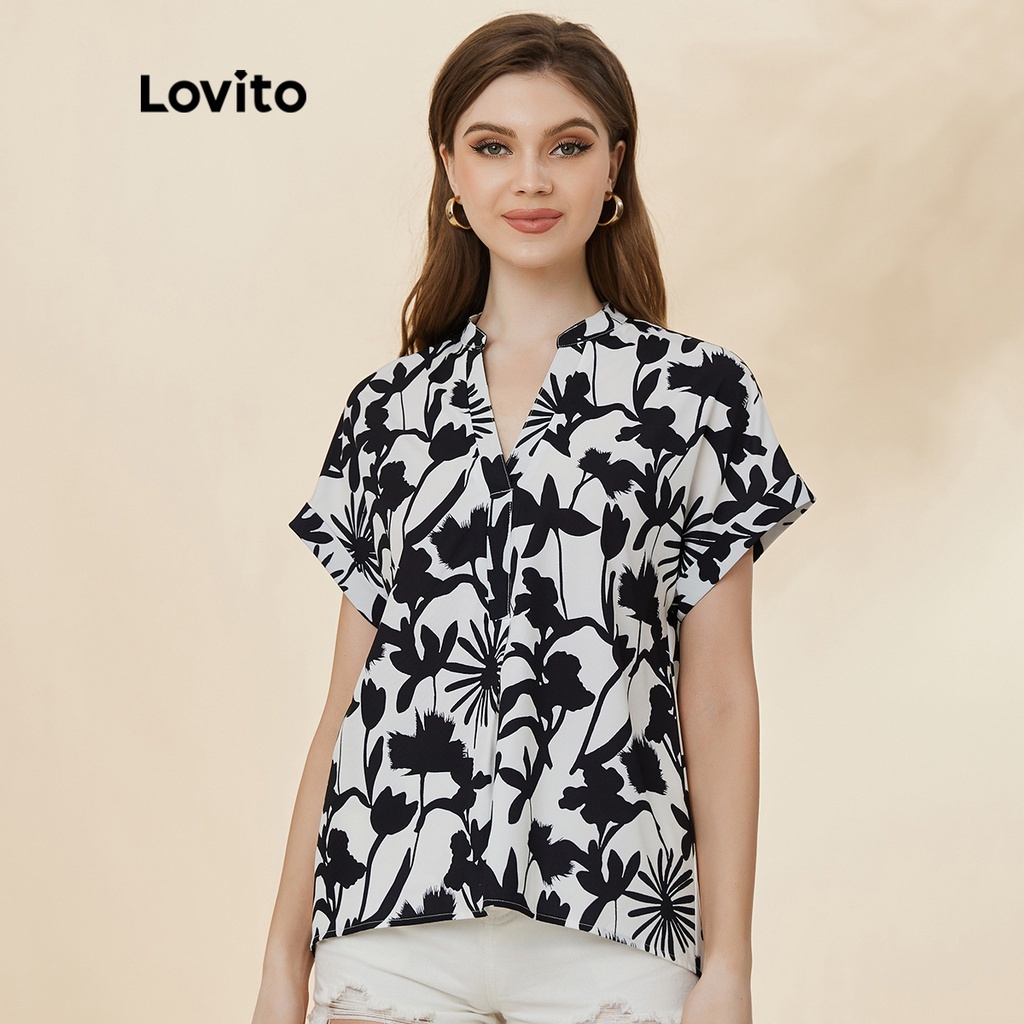 Áo kiểu Lovito thường ngày in hoa cổ chữ V dáng phía trước ngắn phía sau dài công sở L19D431 (trắng và đen)