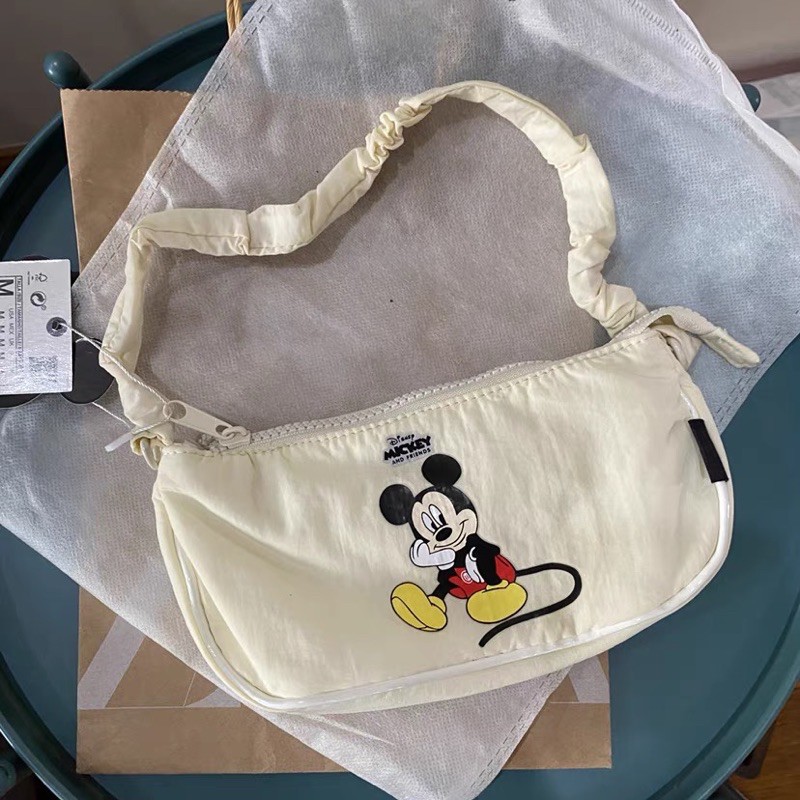 TÚI KẸP NÁCH QUAI XOĂN MICKEY XUẤT