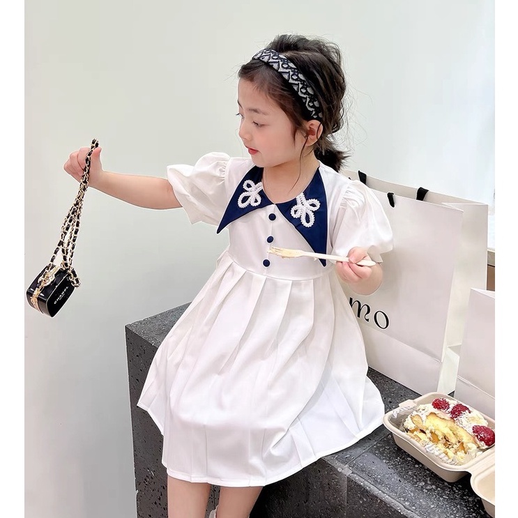 Váy Vạt Cổ Thêu  Xinh Xắn Thiết Kết Dập Ly  - Cúc Bọc Cổ Phong Cách Sang Chảnh Cho Bé Gái