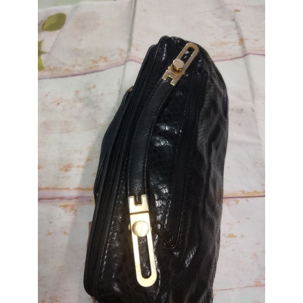 Túi si cluth cầm tay da thật