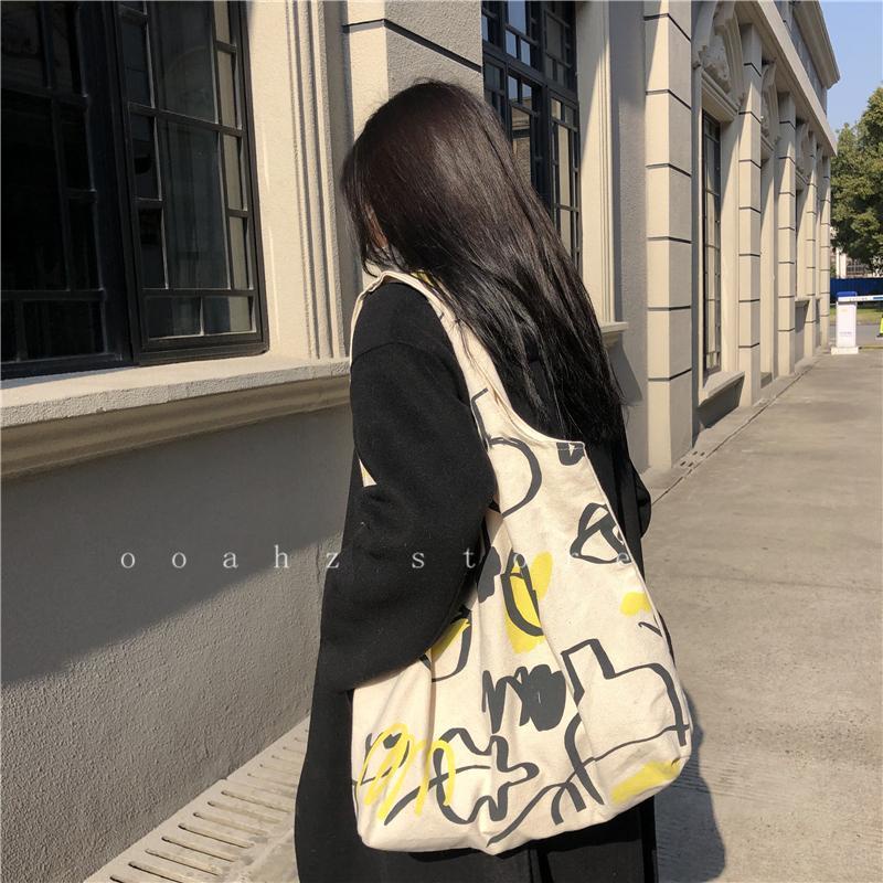 Túi đeo vai bằng vải canvas thiết kế đơn giản dễ phối đồ thời trang